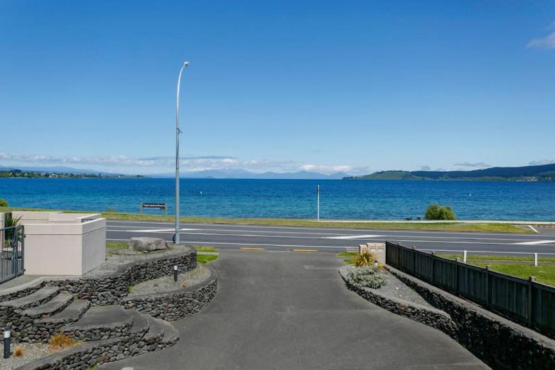Lakefront Living 3-Level Home With Spectacular Water and Mountain Views - image 28