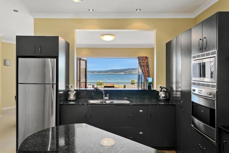 Lakefront Living 3-Level Home With Spectacular Water and Mountain Views - image 14