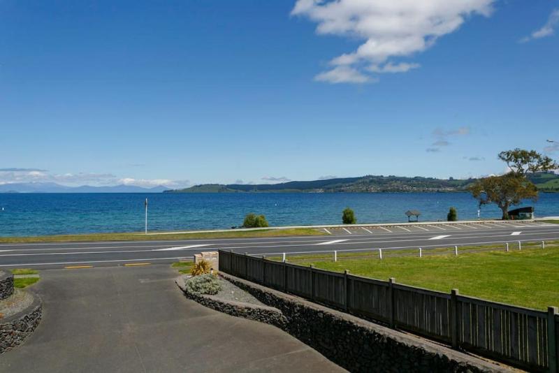 Lakefront Living 3-Level Home With Spectacular Water and Mountain Views - image 5
