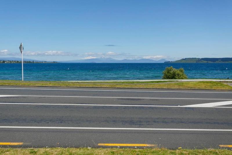 Lakefront Living 3-Level Home With Spectacular Water and Mountain Views - image 16