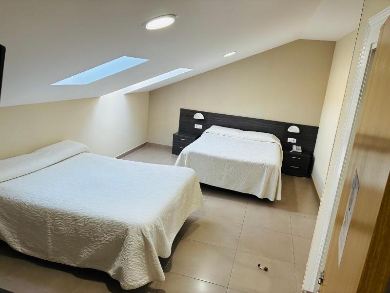 Standard Queen Room with Two Queen Beds image 1