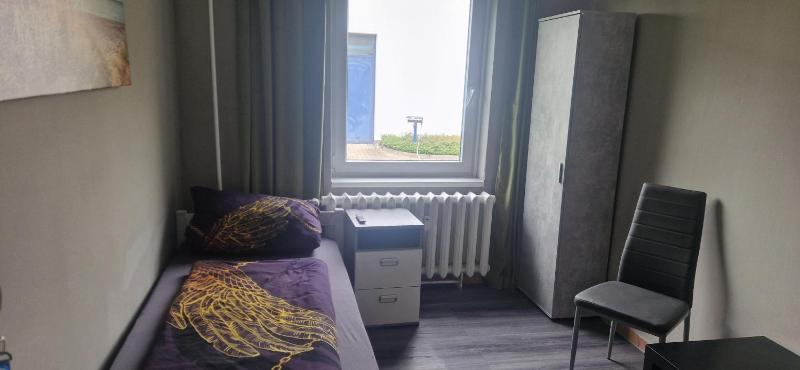 Single Room with Shared Shower and Toilet image 2