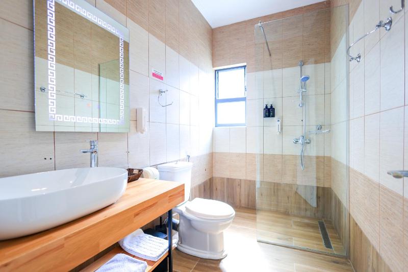 Superior Triple Room with Balcony and Side Sea View image 2