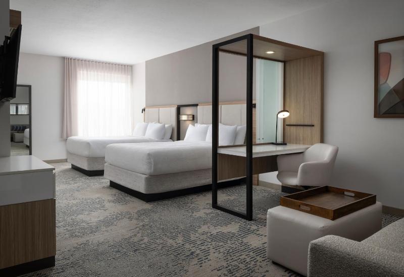 Queen Suite with Two Queen Beds and Sofa Bed image 1