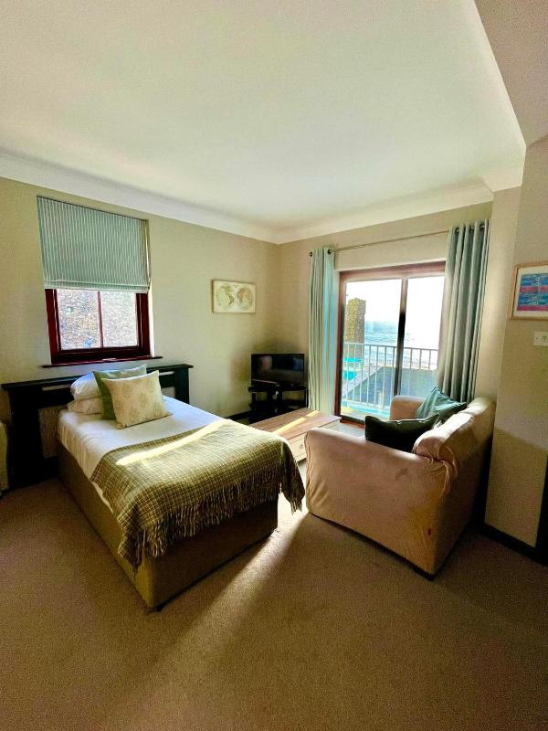 Family Room with Balcony image 1