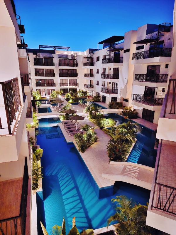 1 BedRoom with King Bed and Balcony with Amenities View - image 6