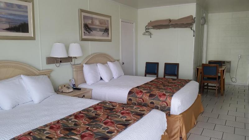 Deluxe Queen Room with Two Queen Beds and Pool View image 1