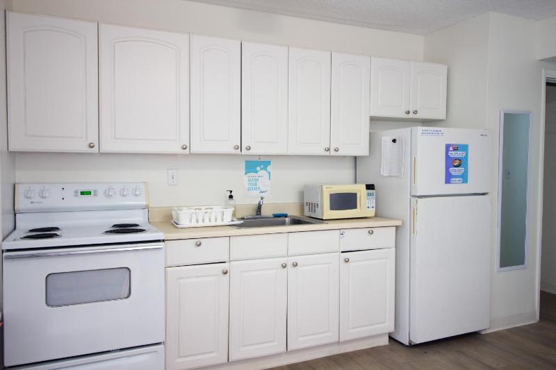 Bed in 4-Bed Female Dormitory Room with Kitchen image 3