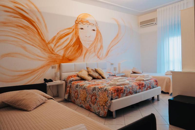 Quadruple Room with Balcony image 1