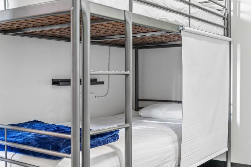 Bed in 8-Bed Mixed Dormitory Room - Shared Bathroom & AC image 4
