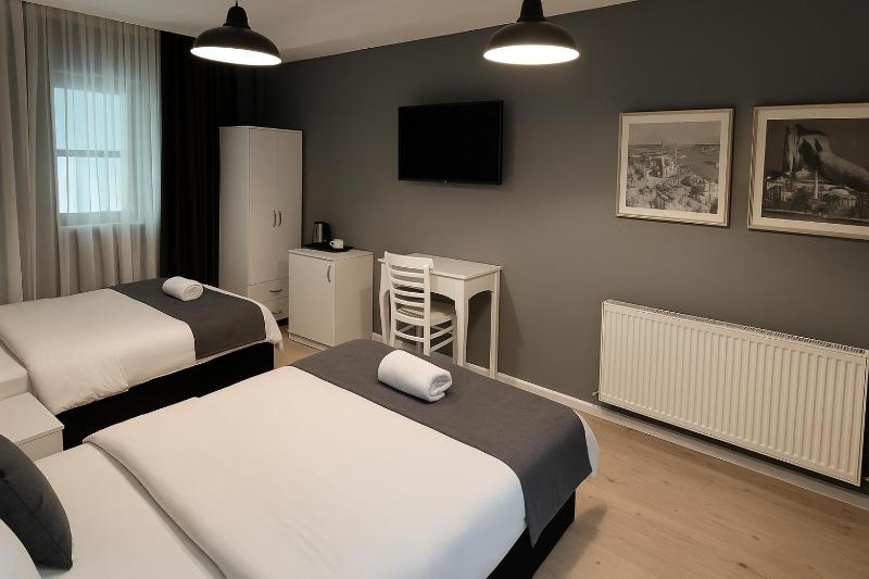 Economy Triple Room - Basement Floor (No Window) image 1