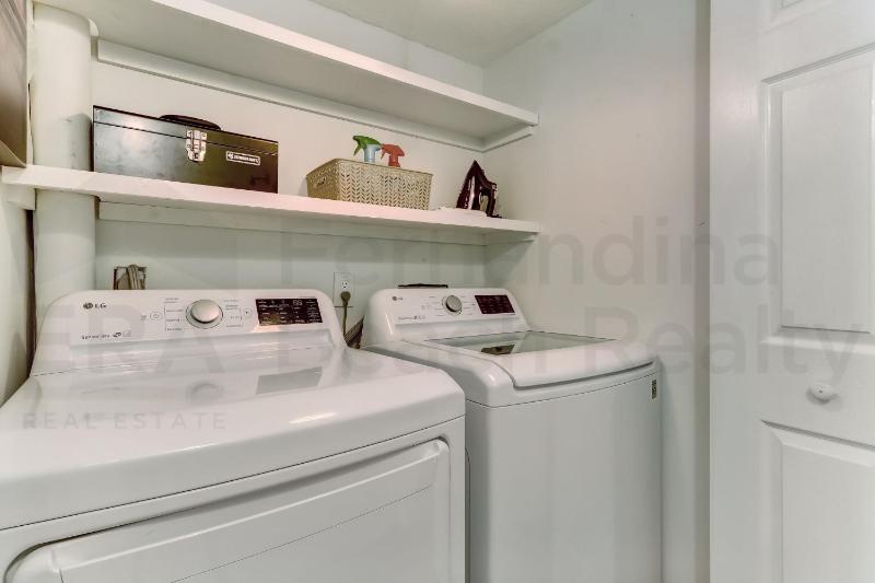 Beautifully Renovated Condo in Small Complex. Relaxation comes easy here. One assigned parking - image 49