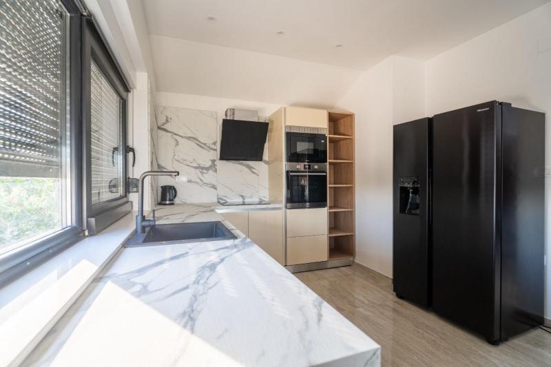 Apartmani Carmen - image 14