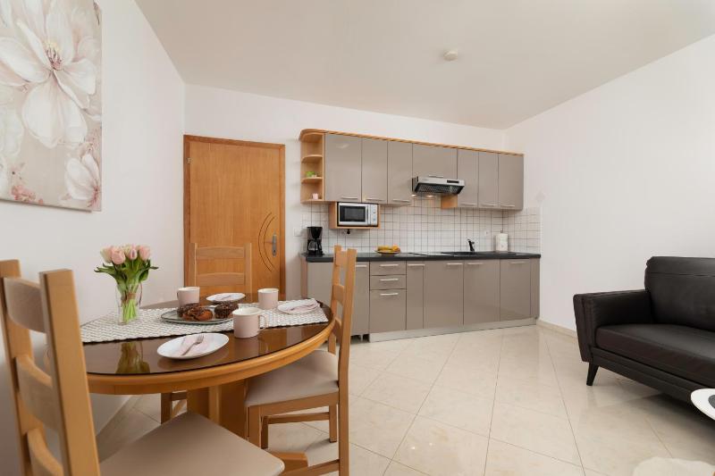 One-Bedroom Apartment with Sea View and Terrace image 1