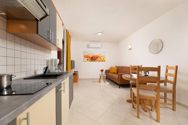One-Bedroom Apartment with Balcony and Sea View image 1