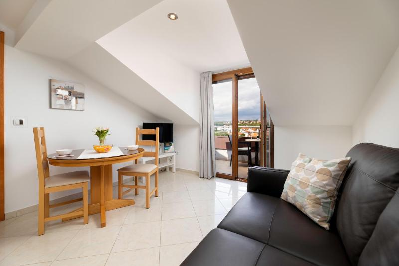 One-Bedroom Apartment with Balcony and Sea View - Attic image 3
