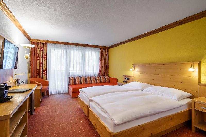 Deluxe Double Room with Matterhorn View and Balcony or Ground Floor Terrace image 1