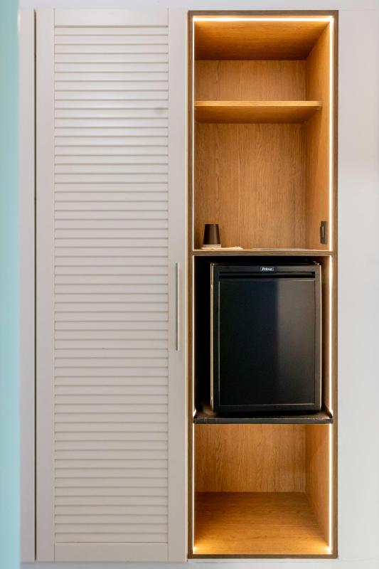 Quadruple Room (2 Adults + 2 Children) with Sea View image 4