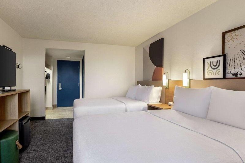 Queen Room with Two Queen Beds and Sofa Bed image 2