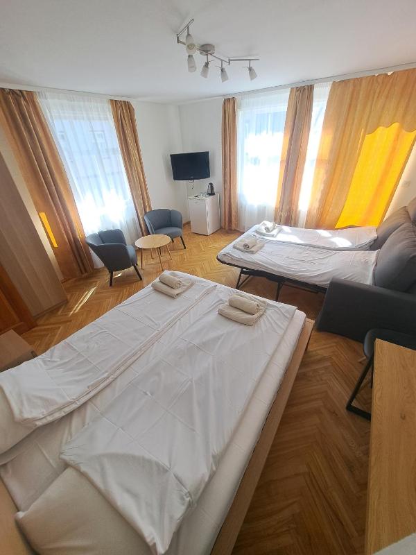 Quadruple Room with Balcony image 1