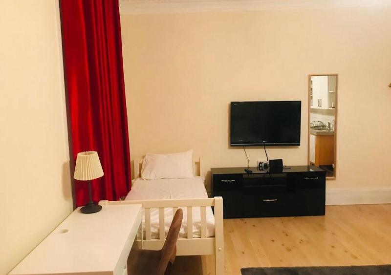 Family Room with Shared Bathroom image 4