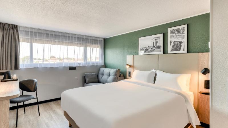 Standard Room with One Queen Bed and One Sofa Bed image 1