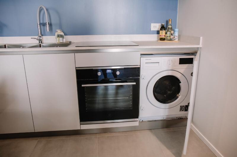 Elegant Beige Apartment - 5 Minutes from the Lake - image 22