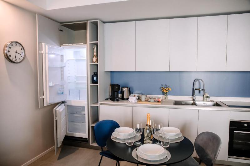 Elegant Beige Apartment - 5 Minutes from the Lake - image 16