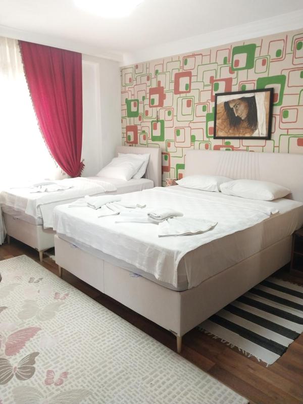 Quadruple Room with Balcony image 1