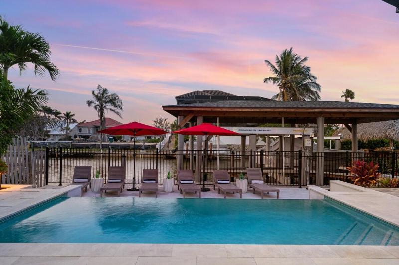 New Listing! Canal Dreaming - Salt Pool - Water View with Dock - image 5