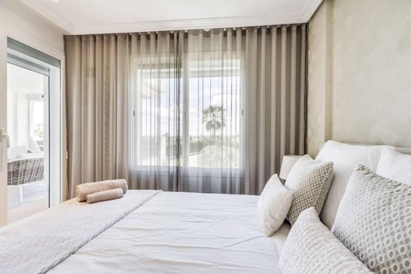 2BR apartment with pool and sea view - image 7