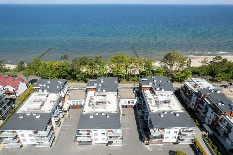 Rewal Cozy Apartment with Parking Gym Spa & Pool close to the Beach by Noclegi Renters - image 2