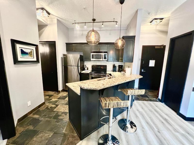 Cozy Canmore resort with mt view hot tub and pool - image 26