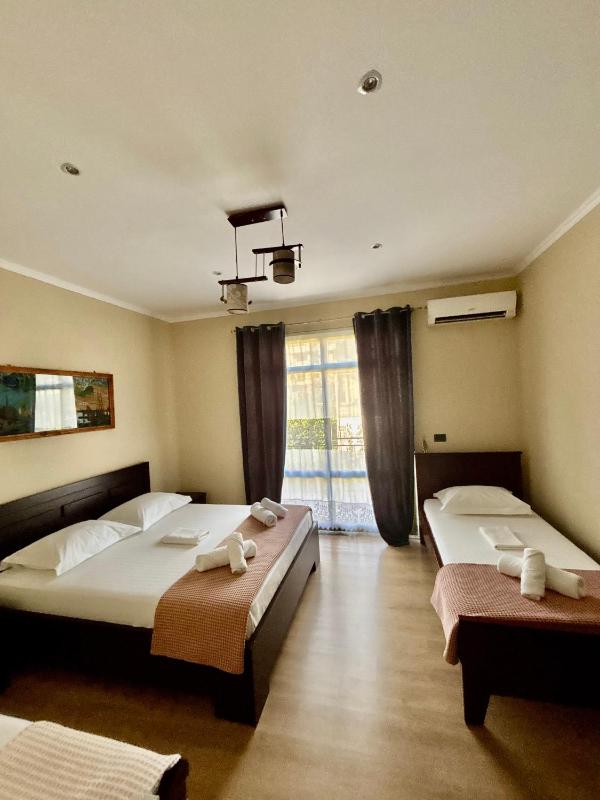 Quadruple Room with Balcony image 1