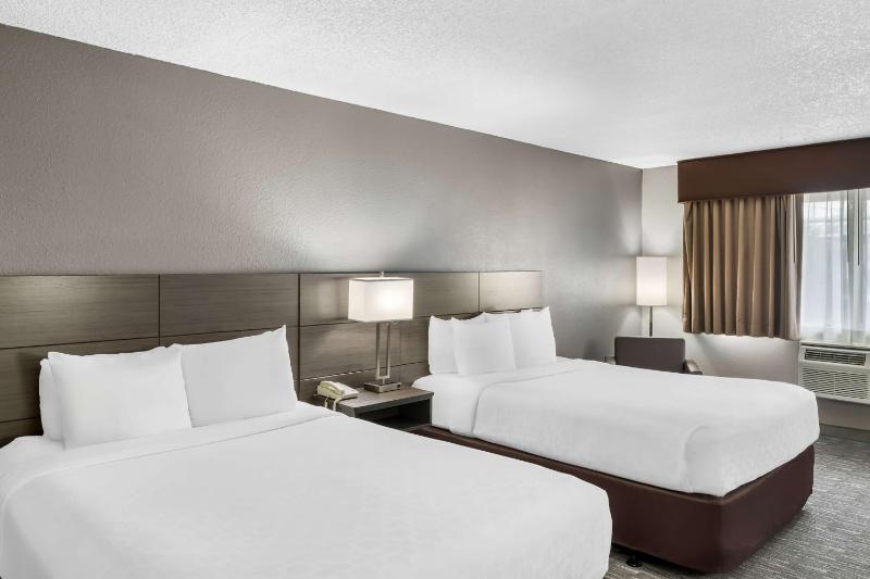 Queen Room with Three Queen Beds image 1