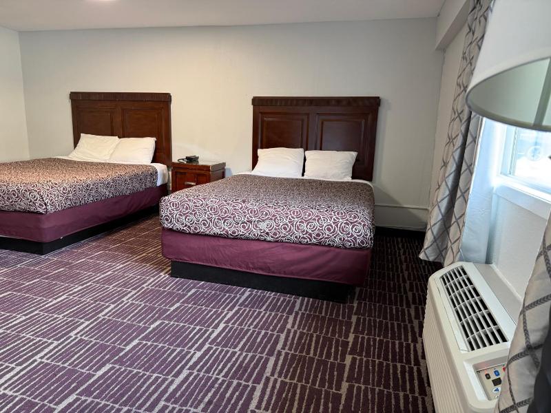 Deluxe Queen Room with Two Queen Beds image 1