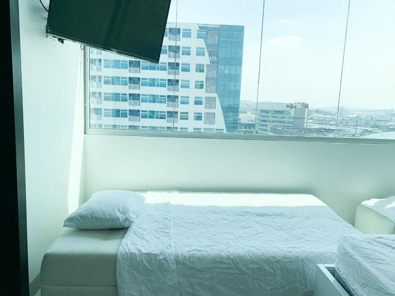 Suite de lujo cerca al aeropuerto terminal mall sol - image 16