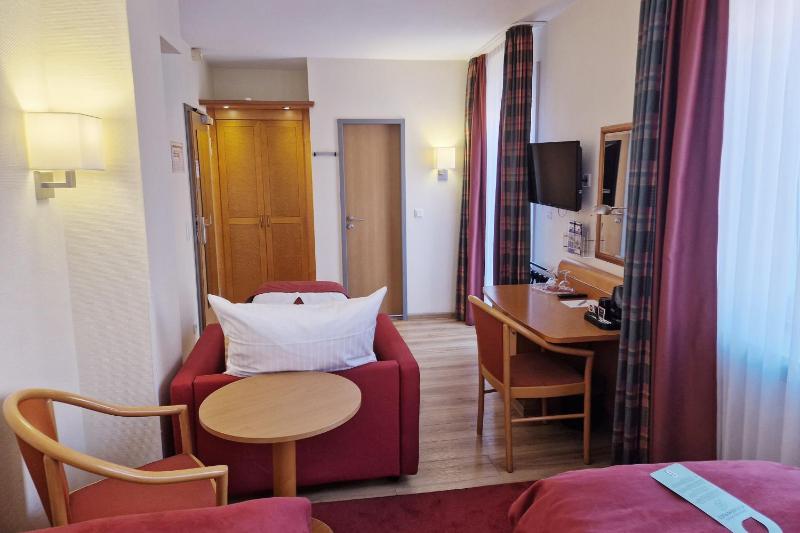 Premium Family Twin Room with Furnished Balcony and Sofa Bed image 3