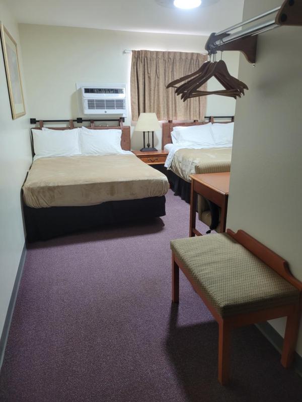 Deluxe Queen Room with Two Queen Beds image 2