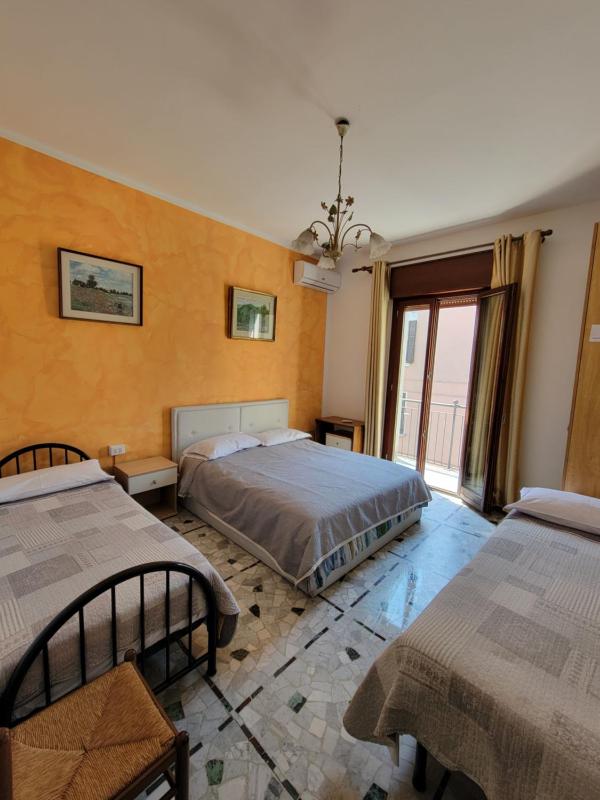 Double with Extra Bed and Shared Bathroom image 1