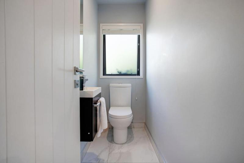 Coastal Retreat w Spa Pool just Steps to the Beach - image 2