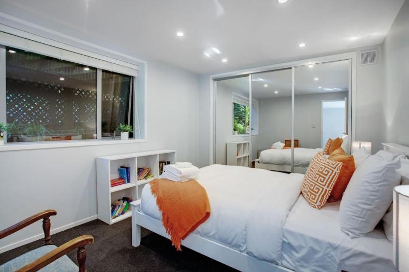 Coastal Retreat w Spa Pool just Steps to the Beach - image 16