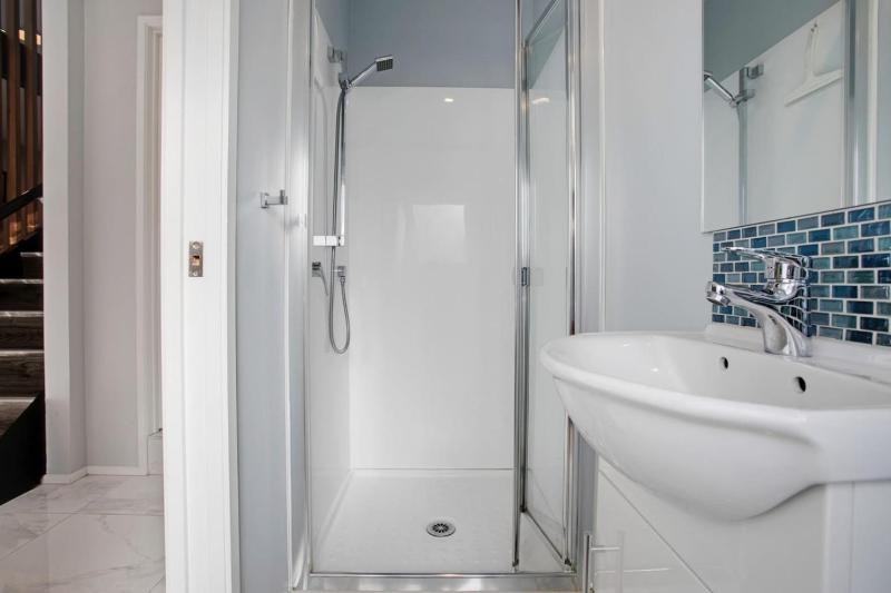 Coastal Retreat w Spa Pool just Steps to the Beach - image 12