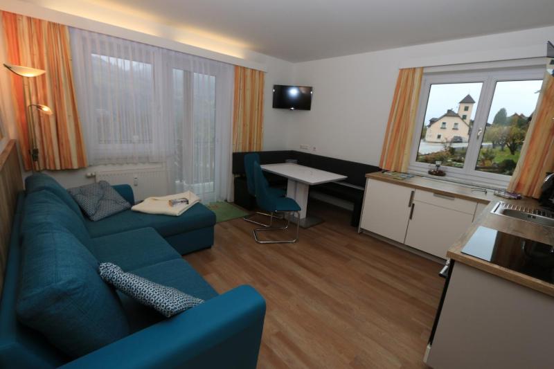 One-Bedroom Apartment with Balcony and Mountain View   image 2
