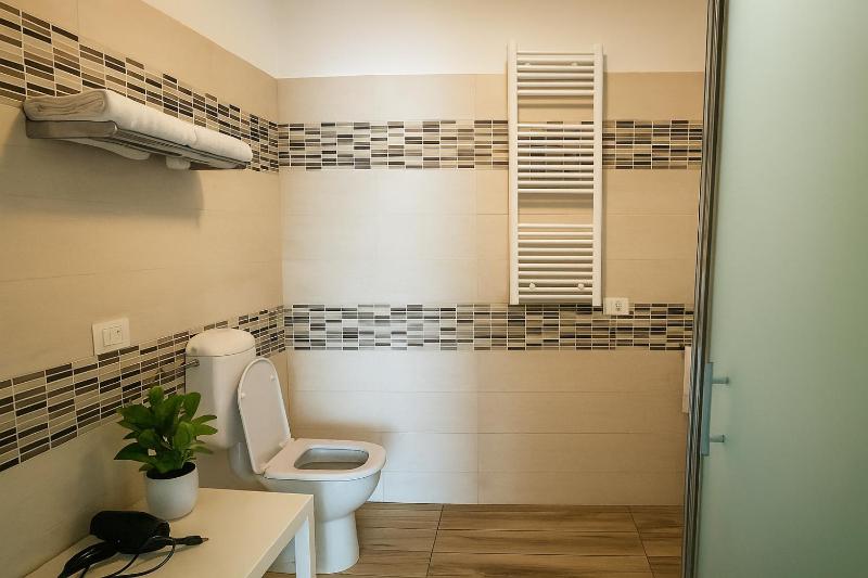 Quadruple Room with Private Bathroom image 1