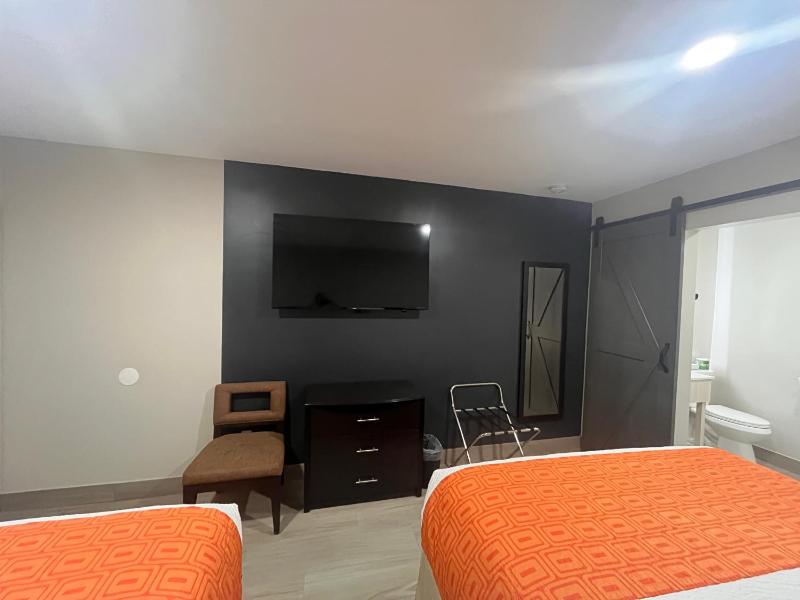 Queen Room with Two Queen Beds and Kitchenette - Non-Smoking image 1