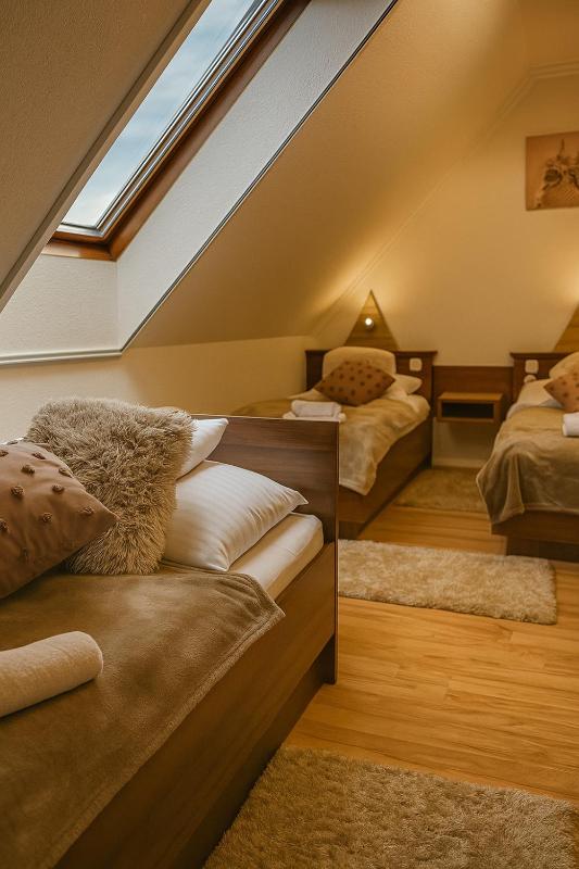 Main Building - Attic triple room image 3