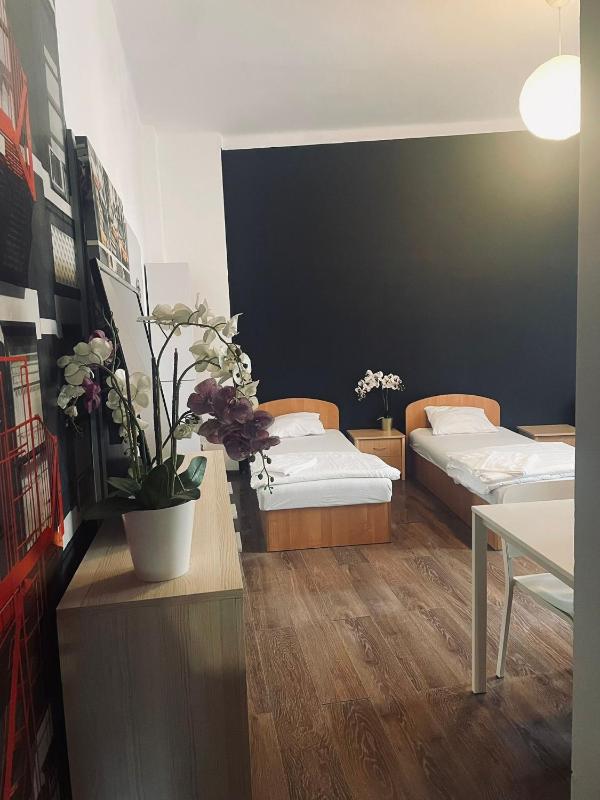 Deluxe Quadruple Room with Private Bathroom image 1