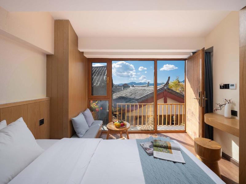 Lijiang MuYa Chinese Courtyard Hotel with Water View - image 17