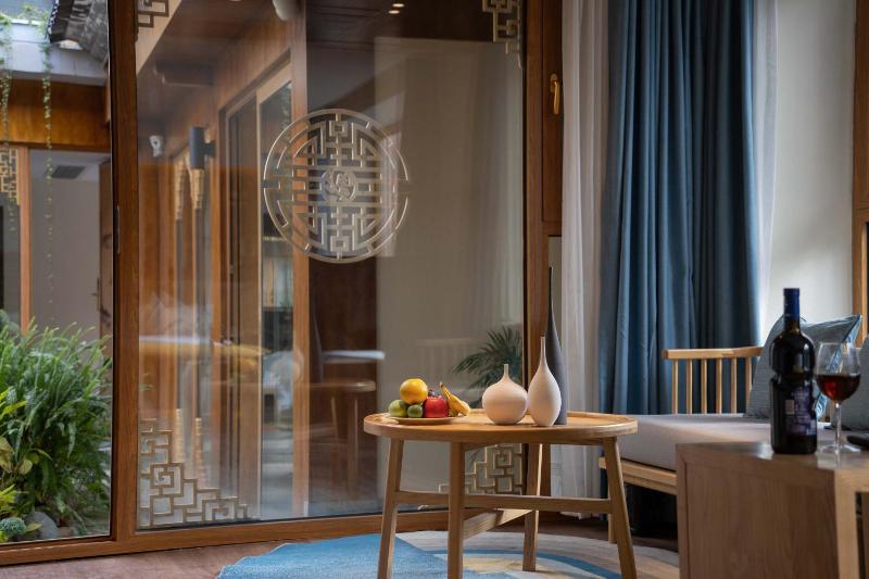 Lijiang MuYa Chinese Courtyard Hotel with Water View - image 15